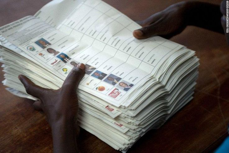 ___7579760___2017___11___10___9___A+voting+assistant+stacks+ballot+papers+marked+with+a+vote+for+presidential+candidate+Raila+Odinga+to