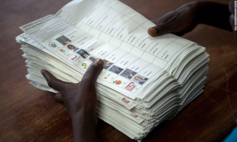 ___7579760___2017___11___10___9___A+voting+assistant+stacks+ballot+papers+marked+with+a+vote+for+presidential+candidate+Raila+Odinga+to