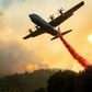 An aircraft drops fire retardant on a ridge during the Walbridge fire, part of the larger LNU Lightning Complex fire, as flames continue to spread in Healdsburg, California on August 20, 2020