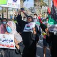 Libyans chant slogans during a demonstration over poor public services at Martyrs' Square in Tripoli on August 25, 2020