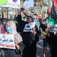 Libyans chant slogans during a demonstration over poor public services at Martyrs' Square in Tripoli on August 25, 2020