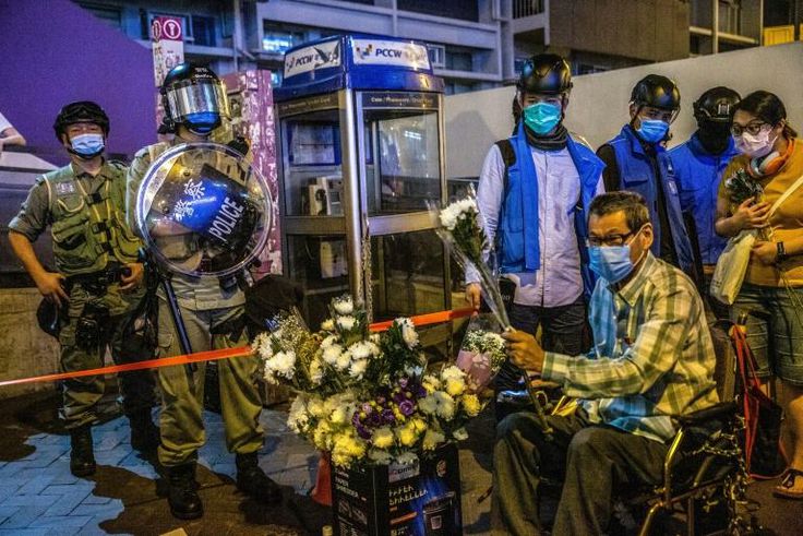 This picture shows a vigil held outside Hong Kong's Prince Edward on 31 May