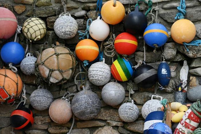 Two cousins who were blown out to off Ireland's west coast were found clinging to a buoy on a lobster pot after a 15-hour ordeal