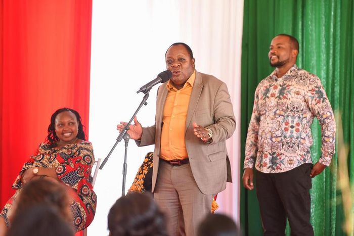 The late Matungu MP Justus Murunga (yellow shirt) during a past public meeting