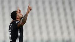 Memphis Depay's first-half penalty helped Lyon to the Champions League quarter-finals