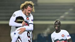 Midtjylland's Scholz (L) scored the opening goal against Atalanta