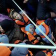 Greek coast guards rescue migrants as they try to reach the island of Lesbos by sea in February 2016 at the height of Europe's worst immigration crisis since WWII