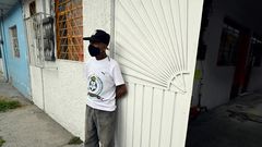 Andres Hernandez became homeless after losing his job in a printing workshop and now lives in a room paid for by a homeless charity