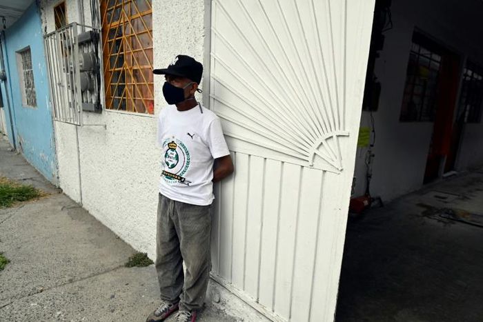 Andres Hernandez became homeless after losing his job in a printing workshop and now lives in a room paid for by a homeless charity