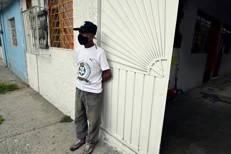 Andres Hernandez became homeless after losing his job in a printing workshop and now lives in a room paid for by a homeless charity