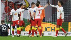 Dani Olmo (C) celebrates scoring RB Leipzig's second goal at home to Bremen on Saturday