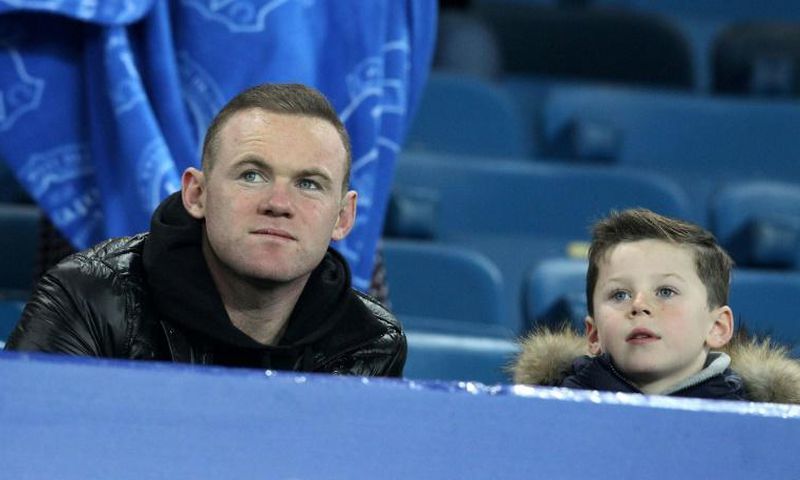 Former Manchester United forward Wayne Rooney pictured with his son, Kai, in 2015