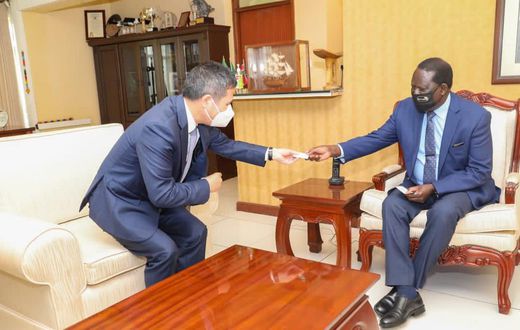 Former Prime Minister Raila Odinga with China's Ambassador to Kenya Zhou Pingjian at his Capitol Hill offices