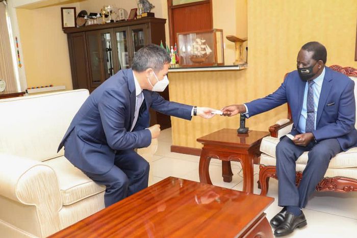 Former Prime Minister Raila Odinga with China's Ambassador to Kenya Zhou Pingjian at his Capitol Hill offices