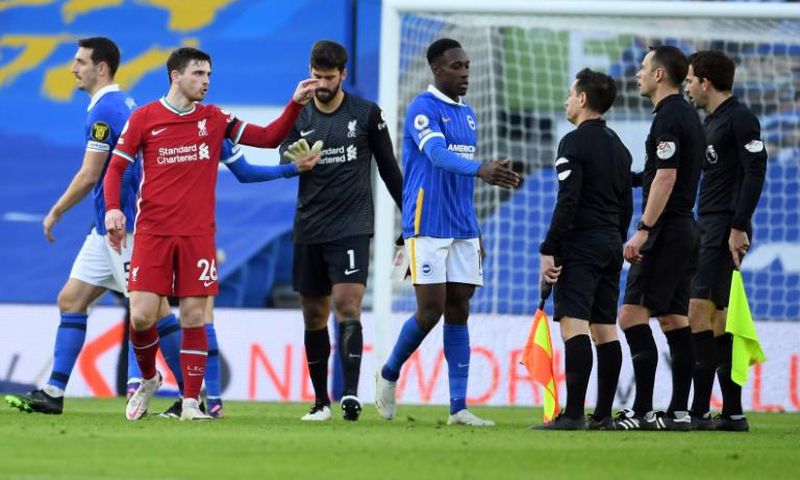 Liverpool defender Andrew Robertson complains to the officials