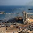 A view of the damaged grain silos of Beirut's harbour and its surroundings one day after a powerful twin explosion tore through Lebanon's capital
