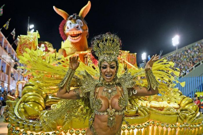 The sumptuous parades and monumental floats attract tens of thousands of tourists to Rio for the carnival every February