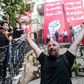 Lebanese protesters celebrate storming the Ministry of Foreign Affairs in Beirut