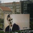 Four alleged members of Hezbollah were on trial in absentia in the Netherlands over the huge Beirut suicide bombing in 2005 that killed former Prime Minister Rafic Hariri, pictured here on a billboard in the Lebanese capital