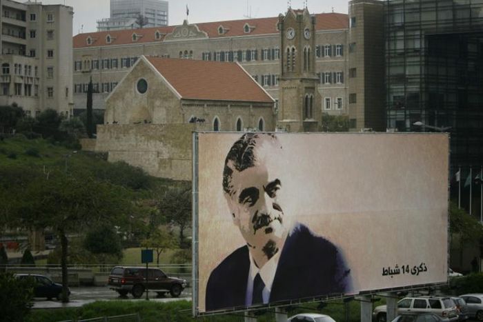 Four alleged members of Hezbollah were on trial in absentia in the Netherlands over the huge Beirut suicide bombing in 2005 that killed former Prime Minister Rafic Hariri, pictured here on a billboard in the Lebanese capital