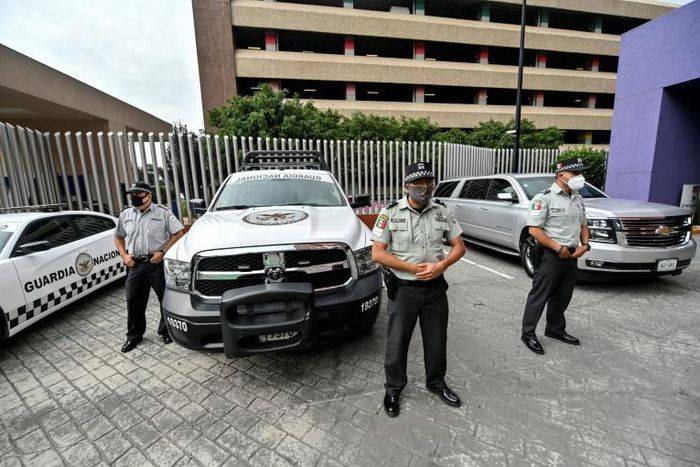 Mexican National Guard officers on watch outside the Pedregal de Angeles hospital in Mexico City where former PEMEX boss Emilio Lozoya is receiving treatment for anaemia