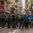 Police flooded Hong Kong's Kowloon district to stamp out protests on Sunday