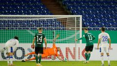 Schalke goalkeeper Ralf Fahrmann (C) saves a penalty from Schweinfurt's Amar Suljic (2ndR) in the home side's 4-1 German Cup victory over Schweinfurt