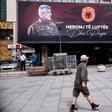 Billboards in Pristina proclaim Kosovo President Hashim Thaci (L) and ex-parliament speaker Kadri Veseli (R) as "heroes of war and peace"