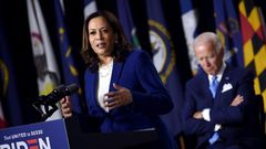 Democratic presidential hopeful Joe Biden listens as his VP pick Kamala Harris rolled out their campaign in Delaware, saying everything is 'on the line'