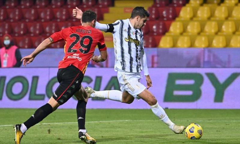 Juventus' Spanish forward Alvaro Morata (R) scored and was sent off against Benevento.
