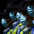 Masked police in front of the shuttered US consulate in Chengdu
