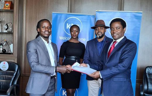 Eugene Mbugua (Left ) Joe Munene Managing Director Broadcast Division The Standard Group, Actor Mwaniki Mageria with the fedora cap and Caroline Wanjiru Production Manager Foods of Kenya