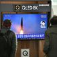 People watch footage of a North Korean missile test at a railway station in Seoul