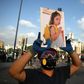 A Lebanese protester carries a photo of three-year-old Alexandra, who was fatally injured in the port explosion