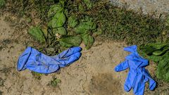 Police say 35 tonnes of gloves used at hospitals were ready to  be sold