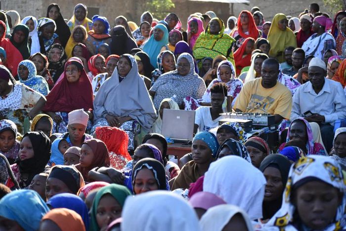 Members of the public crowded without Covid-19 safety precautions during a campaign rally for one of the by-election candidates