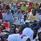 Members of the public crowded without Covid-19 safety precautions during a campaign rally for one of the by-election candidates