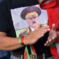 An admirer shows support for President Lukashenko, who vowed to "protect the territorial integrity of our country" ahead of a major rally which the opposition has called for Sunday