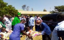 Raila Odinga (facing away) and businessman Jimmy Wanjigi