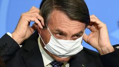 Known as the "Tropical Trump," President Jair Bolsonaro is a divisive figure, condemned as racist, sexist, homophobic and dictatorial by his critics, but adored as a "Messiah" -- his middle name -- by his base