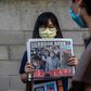 Hong Kongers bought copies of pro-democracy newspaper Apple Daily and shares in its parent company to voice support for its arrested owner