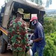 Police remove body of 82-year-old granny who was murdered by her son Edwin Losepish in Maralal, Samburu