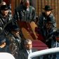 The coffin of Run-DMC's Jam Master Jay, the rapper born Jason Mizell, is carried out of a Queens Cathedral after his funeral on November 5, 2002