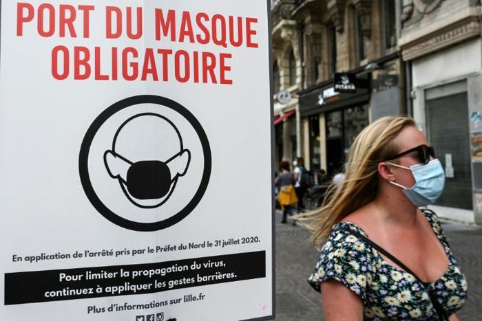 A sign warns passersby that masks are mandatory in Lille, northern France in August 2020