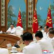 North Korean leader Kim Jong Un convened an emergency politburo meeting on Saturday to implement a "maximum emergency system and issue a top-class alert" to contain the virus, official news agency KCNA said