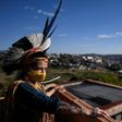 Angoho, an indigenous woman of the Pataxo Ha-ha-hae community, wears a face mask at the Vila Vitoria favela on the outskirts of Belo Horizonte, Brazil