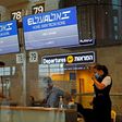 Screens display the flight number of the first-ever commercial flight from Israel to the UAE at the Ben Gurion Airport near Tel Aviv, which will carry a US-Israeli delegation to the UAE following their normalisation accord