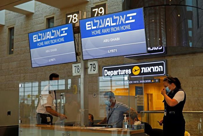 Screens display the flight number of the first-ever commercial flight from Israel to the UAE at the Ben Gurion Airport near Tel Aviv, which will carry a US-Israeli delegation to the UAE following their normalisation accord