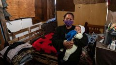 Brazilian Priscila Tomas da Silva now lives in a makeshift shack made from pieces of wood and plastic alongside her husband and six children