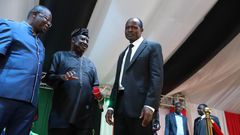 File image of Ochillo Ayacko with Raila Odinga and Okoth Obado